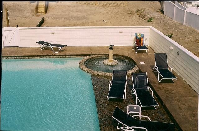 Pool - backyard concrete paver and rectangular lap pool idea