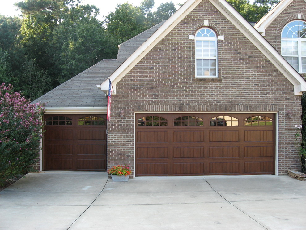 Design ideas for a large traditional attached three-car carport in Raleigh.