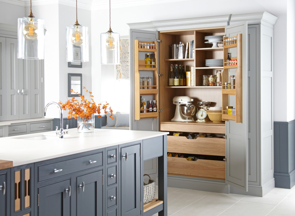 Country kitchen in Other with a single-bowl sink, shaker cabinets, grey cabinets and with island.