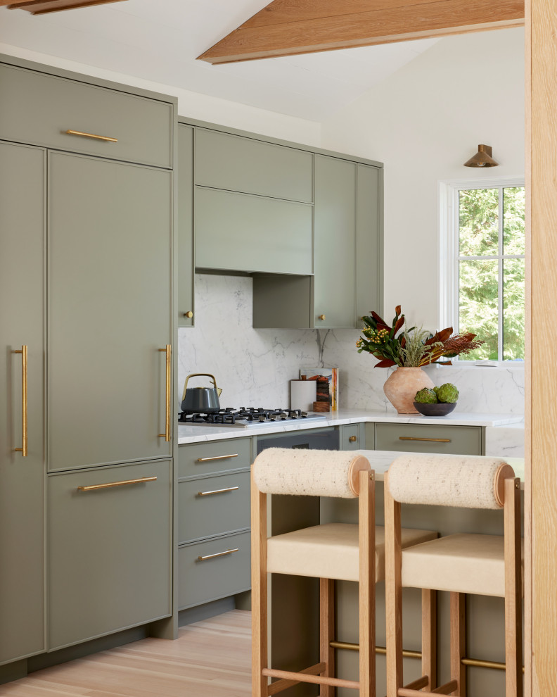 Enclosed kitchen - small transitional u-shaped light wood floor, beige floor and exposed beam enclosed kitchen idea with a farmhouse sink, flat-panel cabinets, green cabinets, marble countertops, white backsplash, marble backsplash, paneled appliances, no island and white countertops