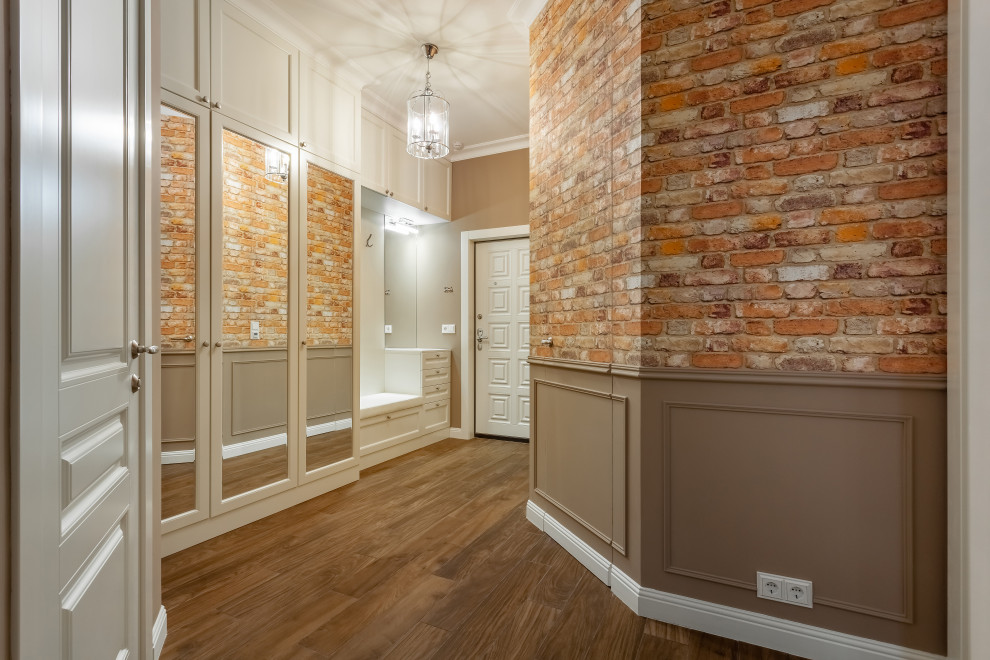 Mid-sized transitional entryway in Other with beige walls, porcelain floors, a single front door, a white front door and wallpaper.
