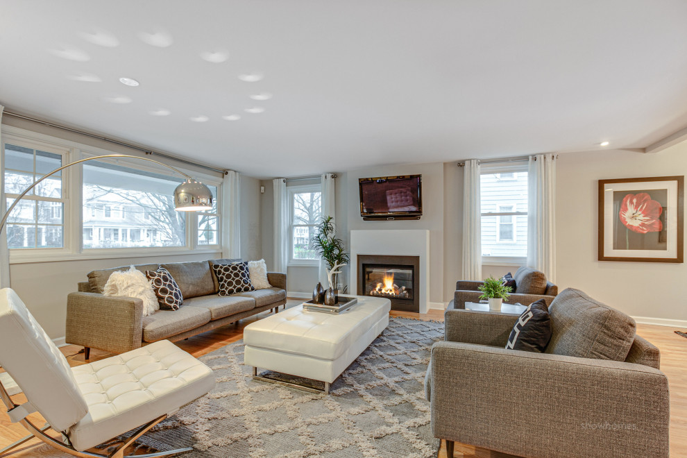Family room - transitional open concept family room idea in Chicago