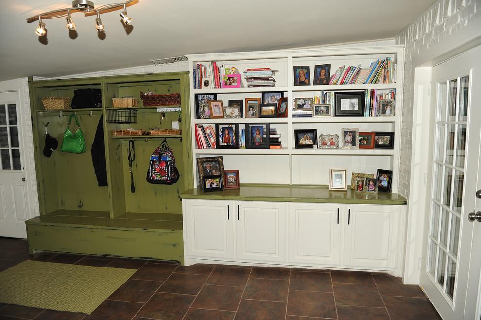 Mid-sized transitional ceramic tile front door photo in Austin with white walls and a white front door