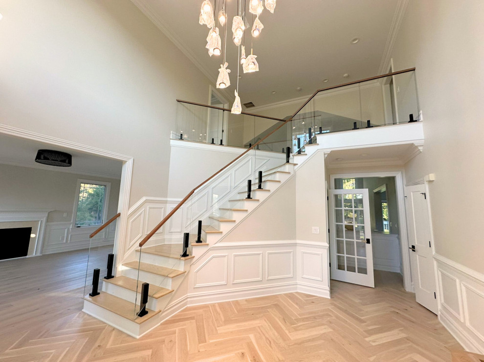 Foyer Staircase with Glass Rail & Herringbone