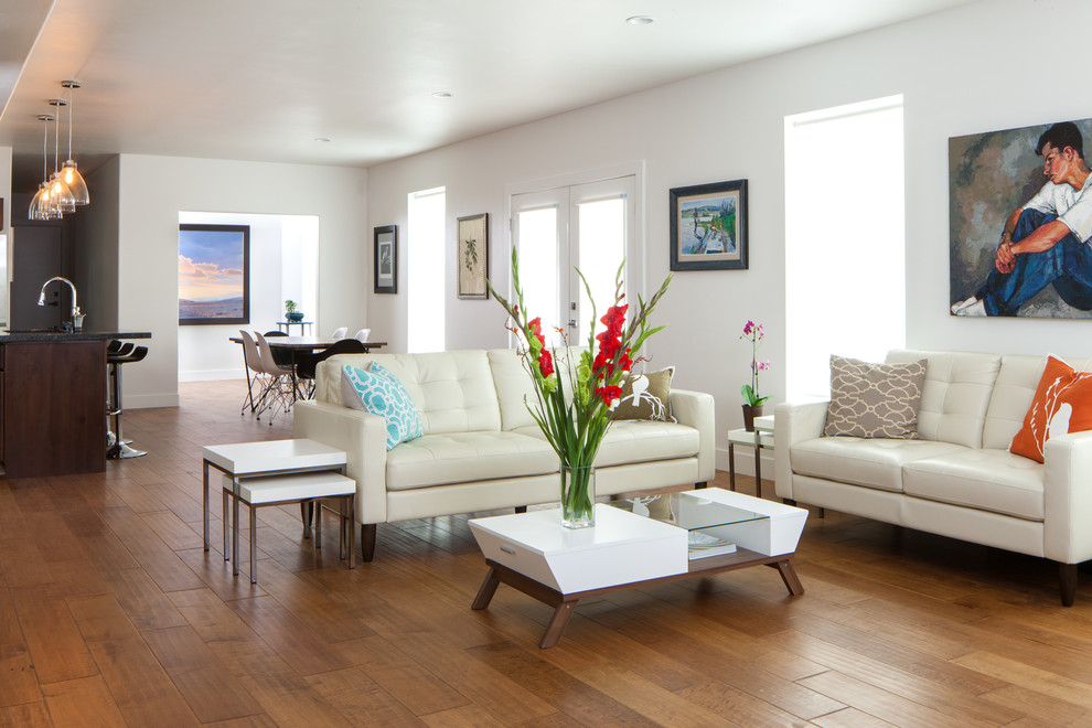 Inspiration for a contemporary living room in Salt Lake City with white walls.
