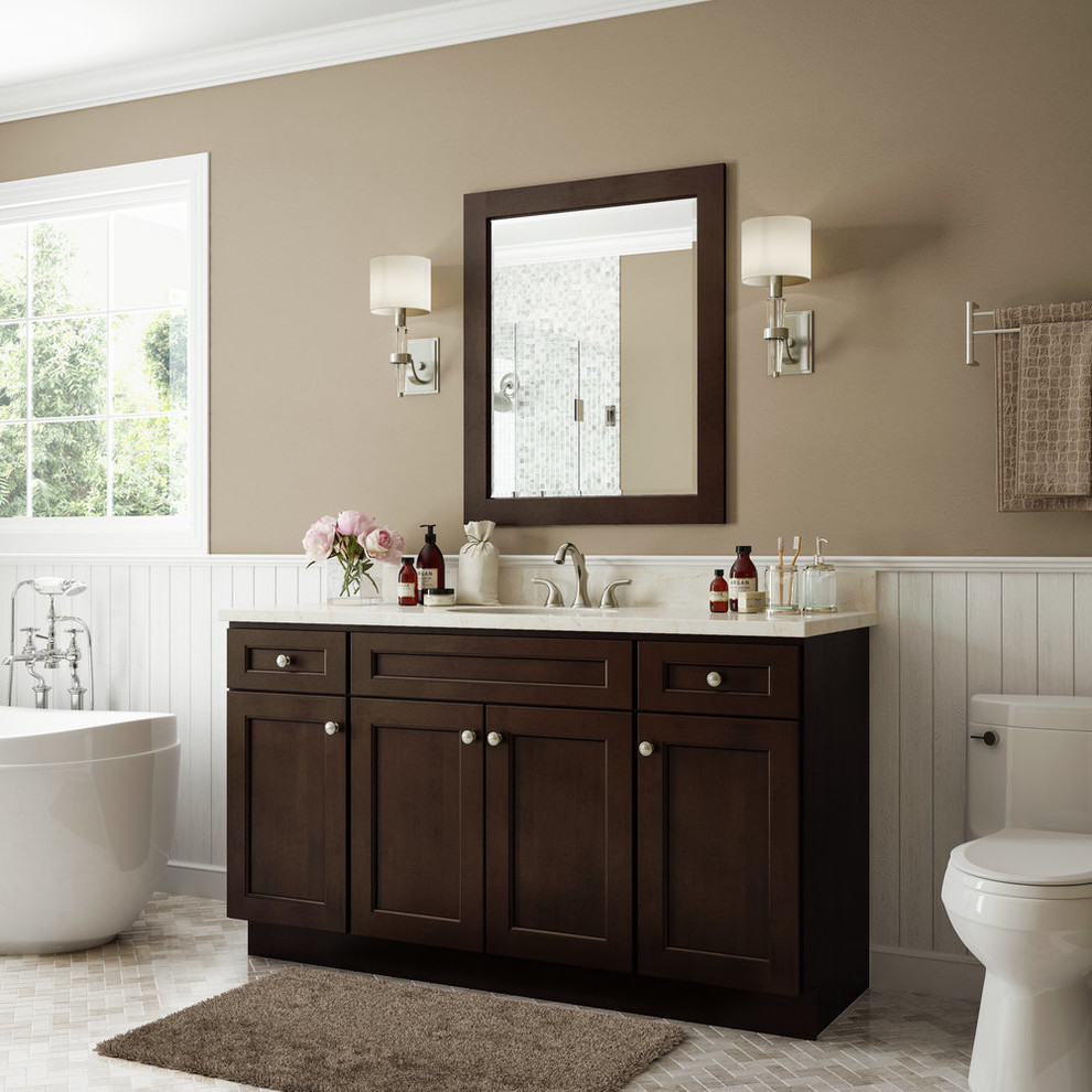 This is an example of a mid-sized transitional master bathroom in DC Metro with shaker cabinets, medium wood cabinets, a freestanding tub, a one-piece toilet, brown walls, an undermount sink, quartzite benchtops and beige floor.