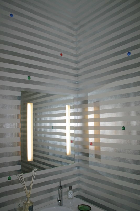 Design ideas for a modern powder room in New York.