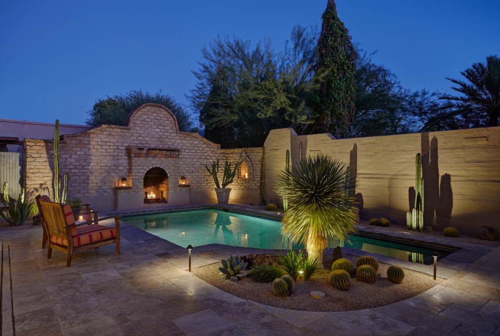 Inspiration for a rustic pool remodel in Phoenix