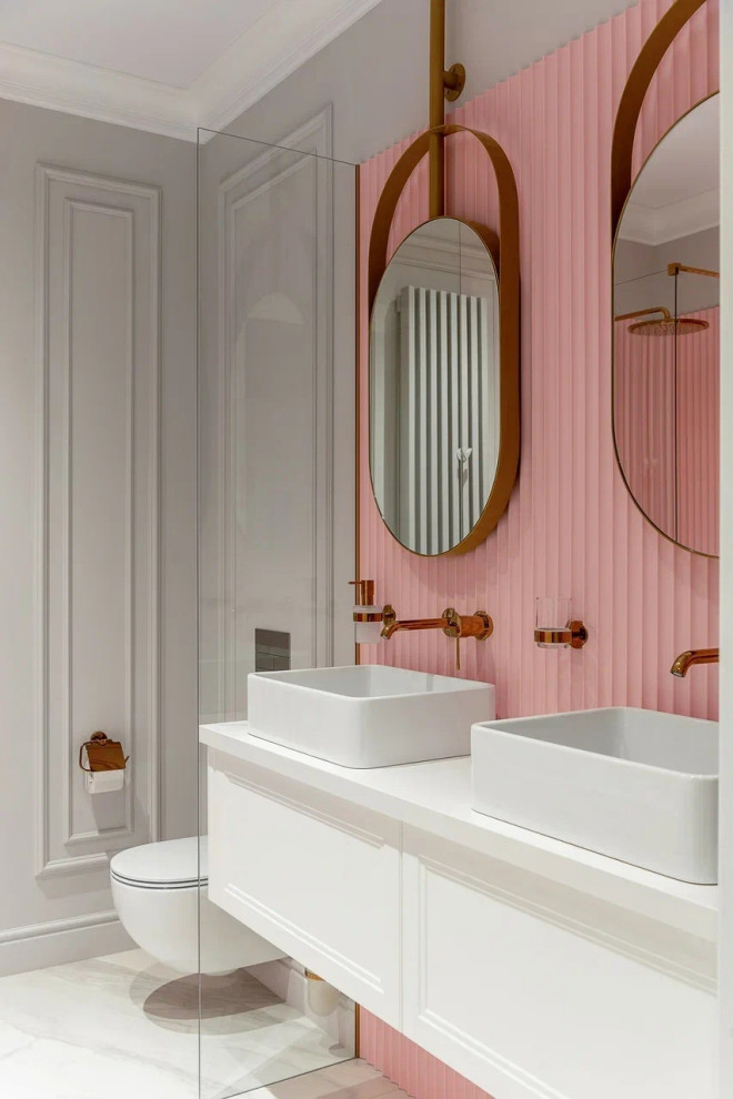Inspiration pour une grande salle de bain grise et blanche design pour enfant avec un placard avec porte à panneau surélevé, des portes de placard blanches, une baignoire en alcôve, WC suspendus, un carrelage rose, un mur gris, un sol en carrelage de porcelaine, un lavabo posé, un plan de toilette en surface solide, un sol gris, une cabine de douche à porte battante, un plan de toilette blanc, meuble double vasque, meuble-lavabo suspendu, un plafond décaissé et du lambris.