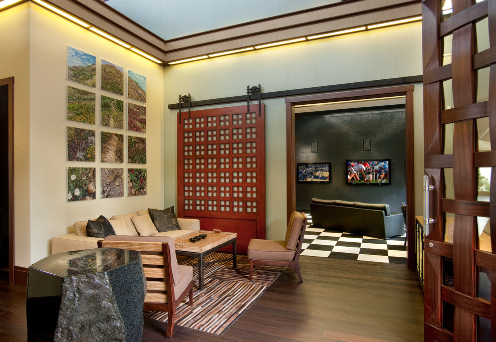 This is an example of a small asian formal open concept living room in San Diego with beige walls, dark hardwood floors, no fireplace and brown floor.