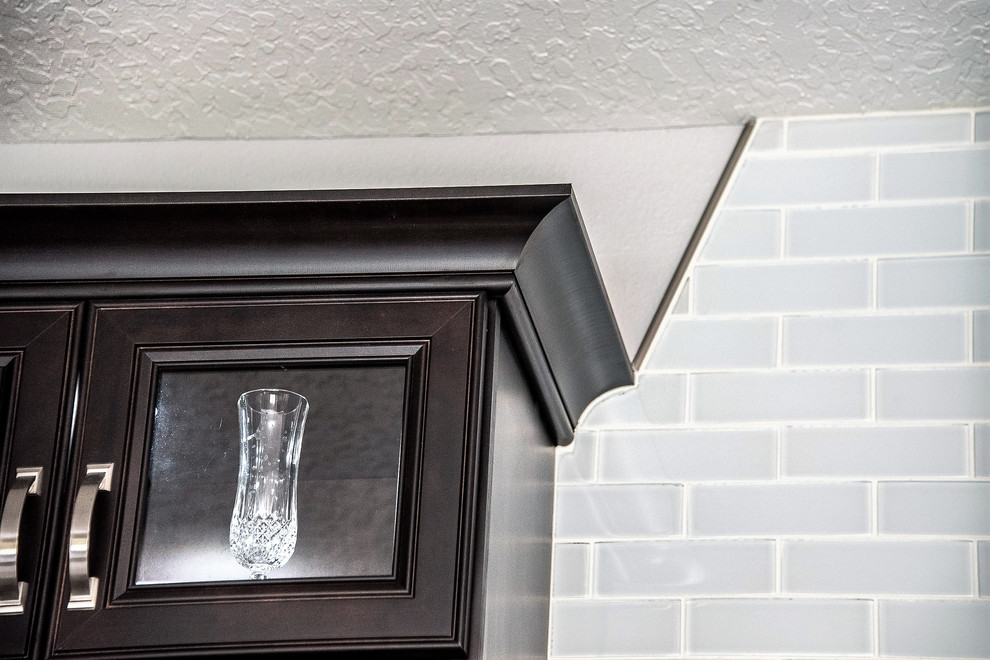 Example of a transitional kitchen design in Orlando