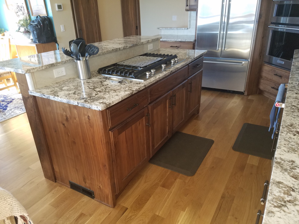 Example of a mountain style kitchen design in Denver