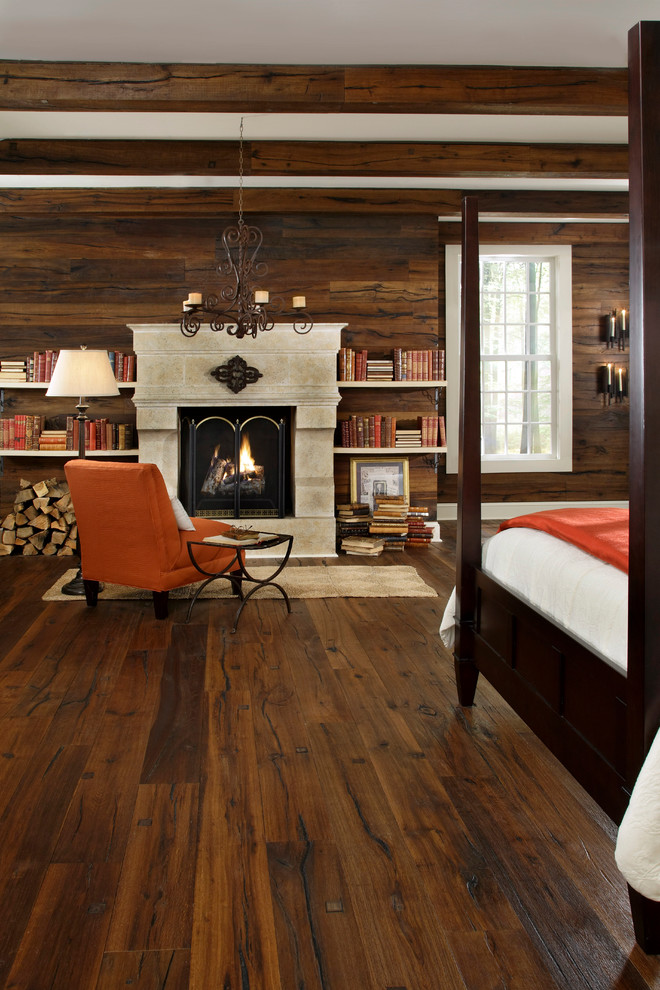 Inspiration for a transitional master bedroom in Philadelphia with dark hardwood floors, brown walls, a standard fireplace and a concrete fireplace surround.
