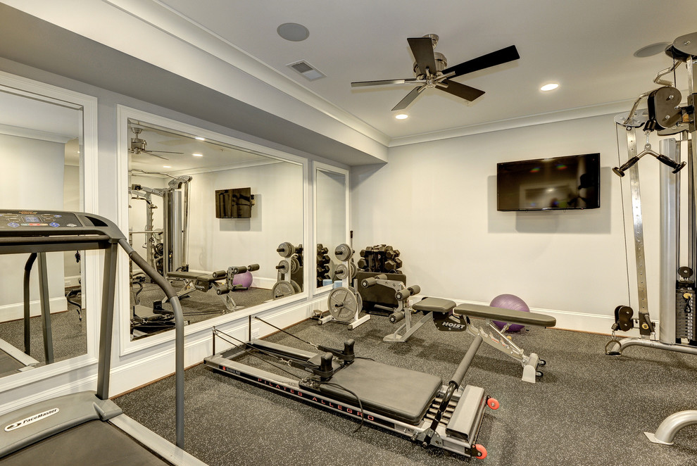Inspiration for a mid-sized modern multipurpose gym in DC Metro with grey walls and grey floor.