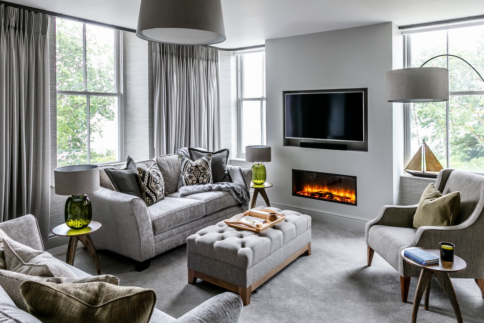 This is an example of a transitional living room in Other with grey walls, a ribbon fireplace and grey floor.