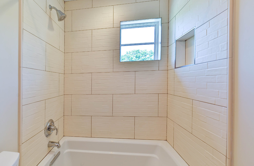 Mid-sized modern kids bathroom with flat-panel cabinets, dark wood cabinets, a drop-in tub, a corner shower, a two-piece toilet, beige tile, cement tile, beige walls, ceramic floors, an undermount sink and engineered quartz benchtops.