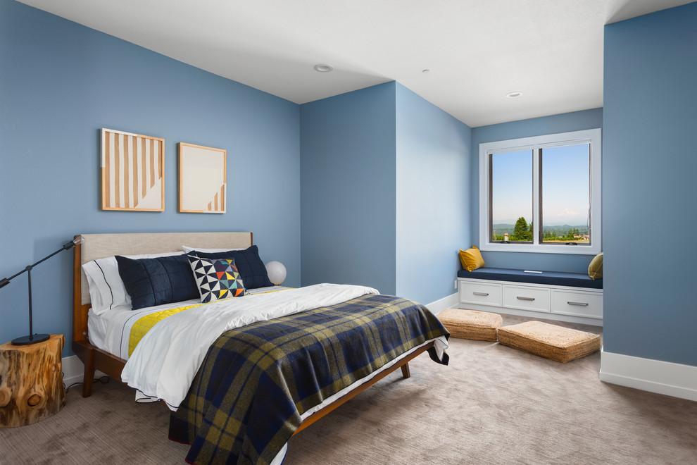 This is an example of an expansive transitional bedroom in Portland with blue walls, carpet and no fireplace.