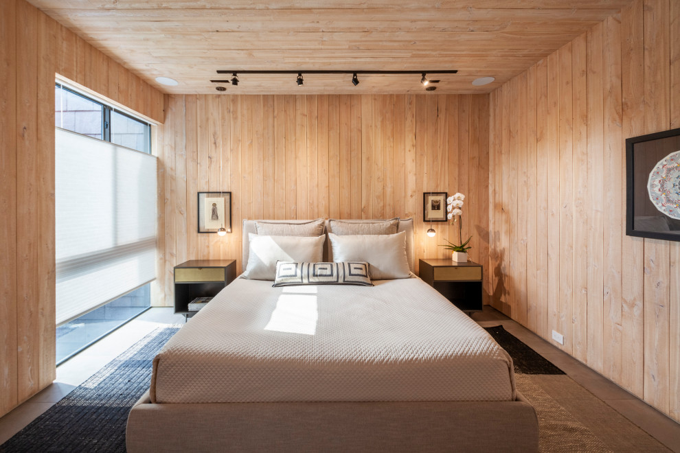 435W and 104N Adams - Inspiration for a mid-sized contemporary guest concrete floor, gray floor, wood ceiling and wall paneling bedroom remodel in Dallas with brown walls