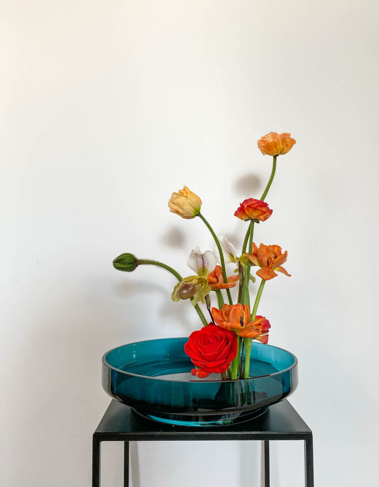 Flower arrangements in an&angel glass