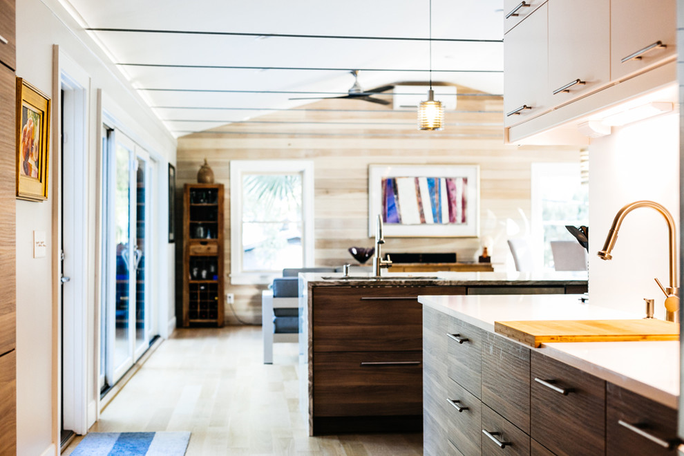 This is an example of a mid-sized contemporary kitchen in Charleston.