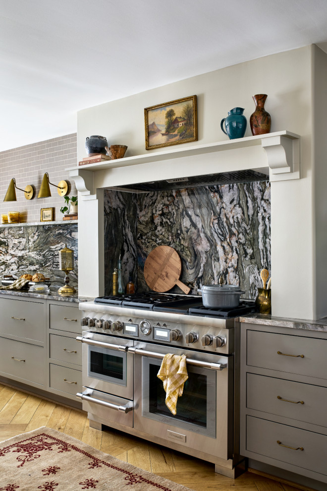 Inspiration for a large transitional l-shaped light wood floor and brown floor open concept kitchen remodel in Baltimore with gray cabinets, multicolored backsplash, stainless steel appliances, multicolored countertops, recessed-panel cabinets, two islands, marble countertops and marble backsplash