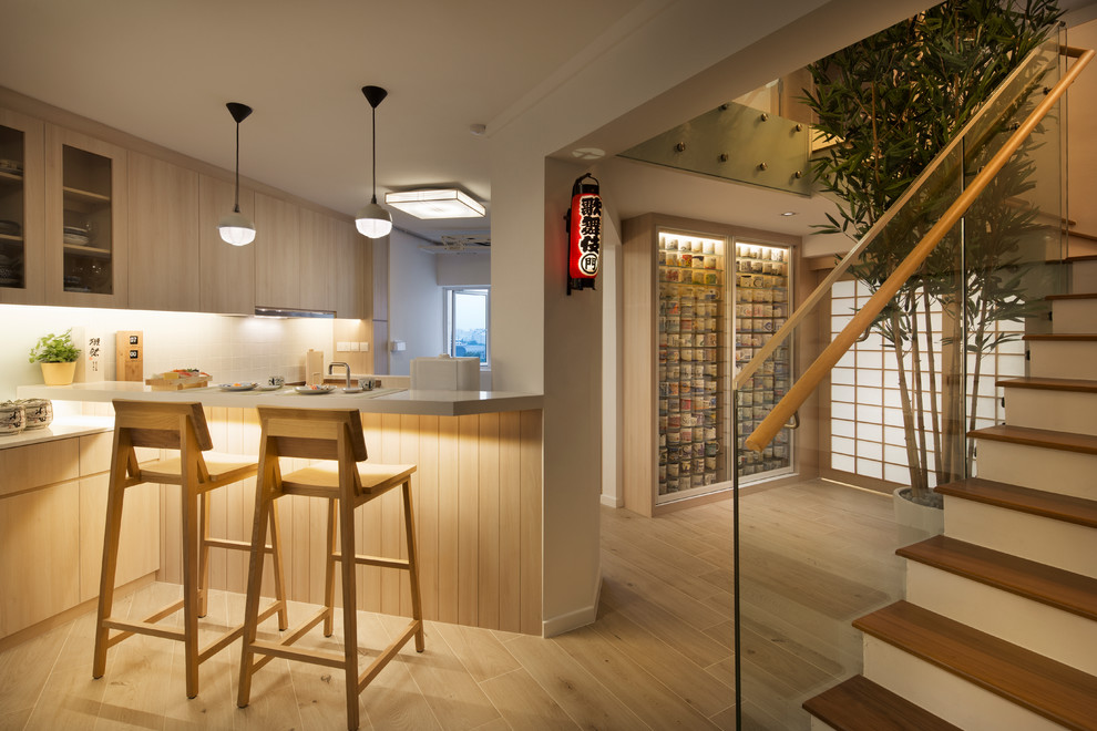 Inspiration for an Asian home bar in Singapore.