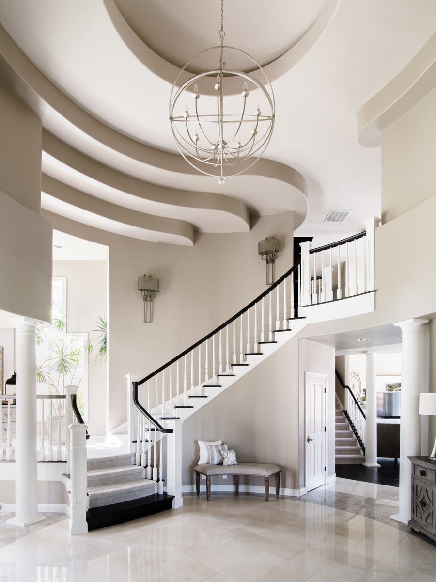 Mid-sized transitional marble floor and gray floor foyer photo in Seattle with gray walls and a dark wood front door