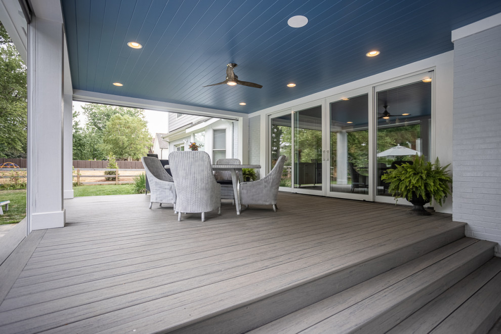 Example of a large transitional backyard rectangular lap pool design in Cincinnati