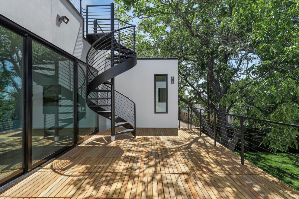 Balcony - mid-sized modern metal railing balcony idea in Austin with no cover