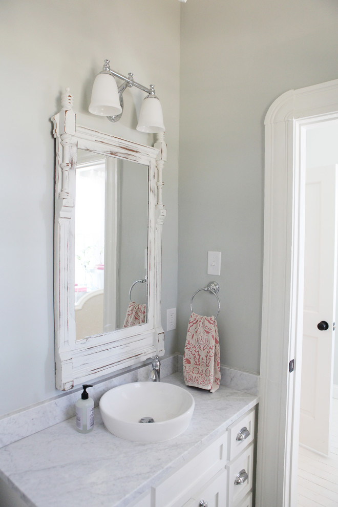 Design ideas for a small country bathroom in Austin with grey walls and painted wood floors.