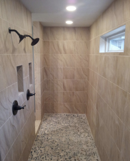 Drop-in bathtub - large transitional master beige tile beige floor drop-in bathtub idea in Austin with shaker cabinets, dark wood cabinets and beige walls