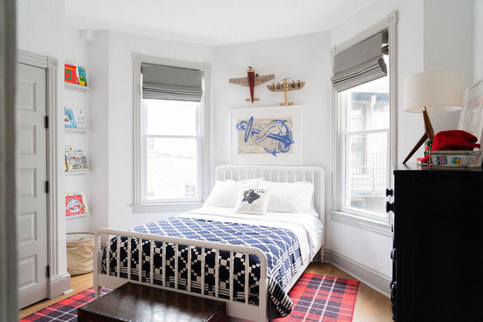Inspiration for a transitional boy light wood floor, brown floor and wallpaper kids' bedroom remodel in Jacksonville with gray walls