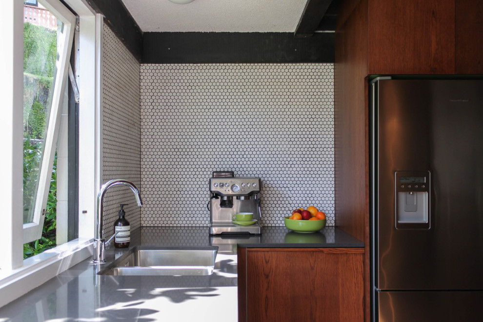 Design ideas for a Mid-sized arts and crafts U-shaped kitchen pantry With a Double-bowl Sink, Raised-panel Cabinets, Medium Wood Cabinets, Quartz Benchtops, White Splashback, Mosaic Tile Splashback, Stainless Steel Appliances, Cork Floors, no Island, Grey Benchtop and Exposed Beam.