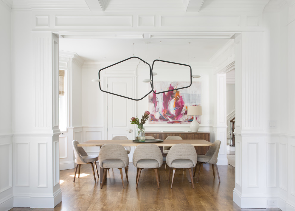 Modern Dining Room with Sculptural Chandelier and Vibrant Art ...