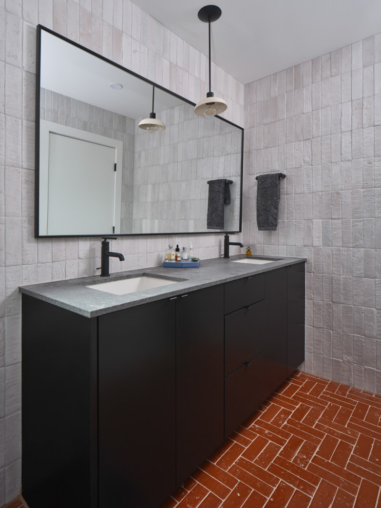 Inspiration for a small modern bathroom in Austin with grey cabinets, grey tiles, brick flooring, concrete worktops, red floors, double sinks and a built in vanity unit.
