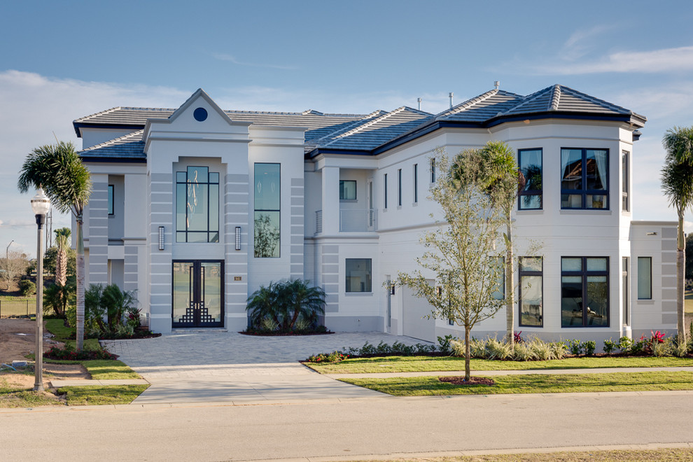 Example of a tuscan home design design in Orlando