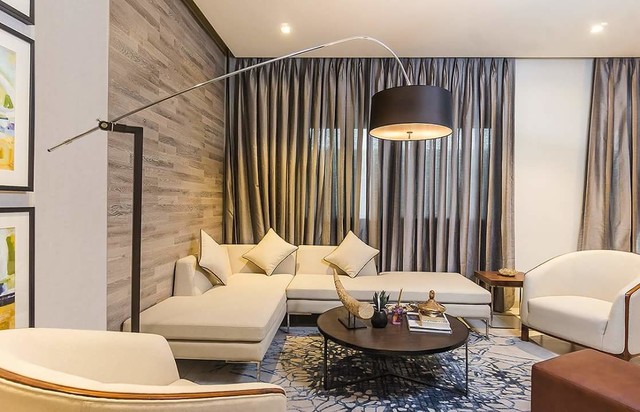 25 BHK Home Interiors In Doddanekundi Bangalore  DesignCafe  Classy  living room Living room tiles Room wall tiles