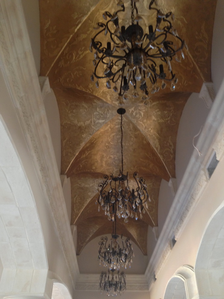 Inspiration for a large timeless foyer remodel with beige walls