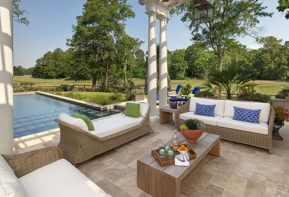 Photo of a beach style patio in Charleston.