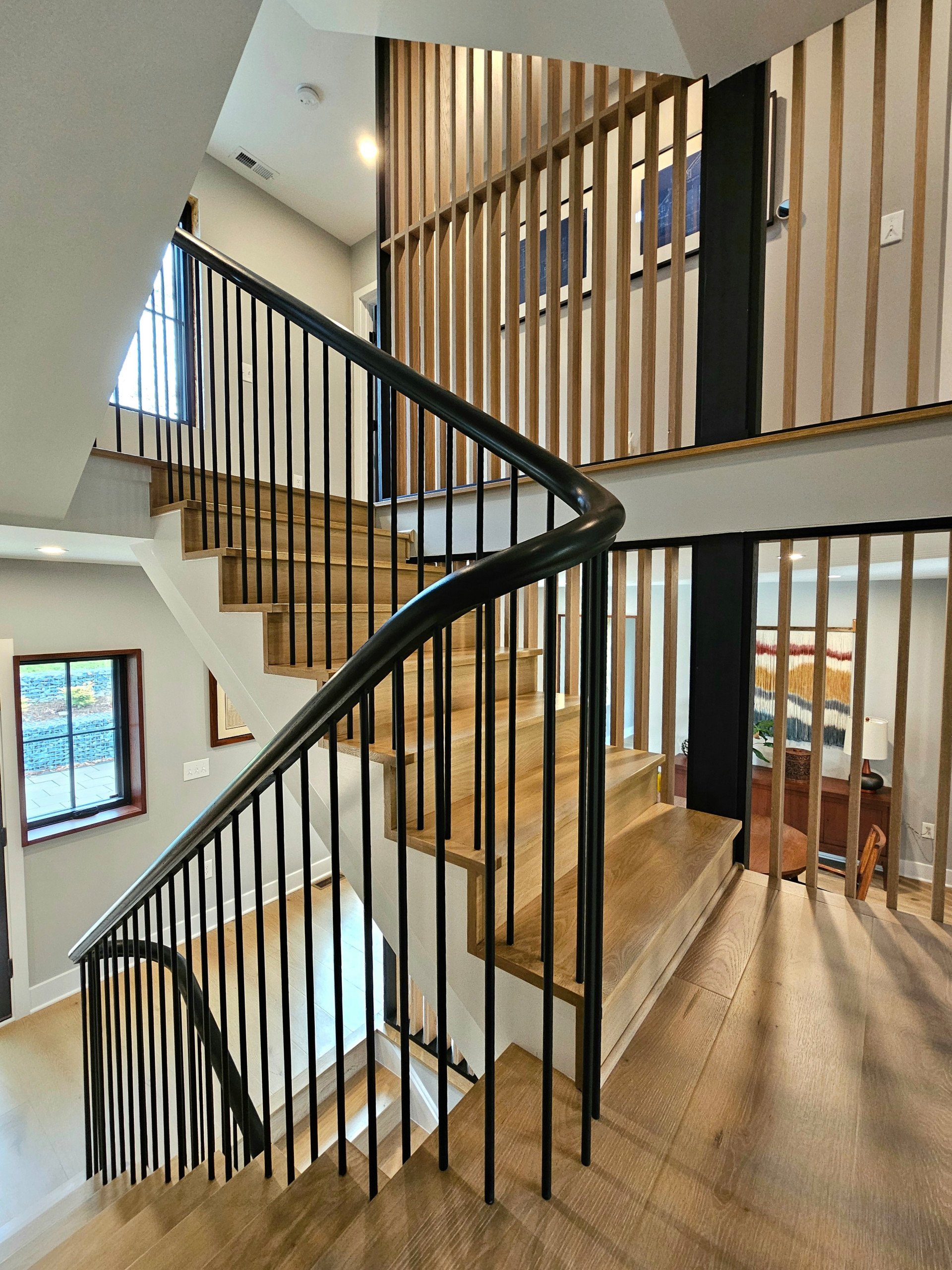 115_Stunning Continuous Rail System on 3 Story Floating Stairs; Arlington, VA 22