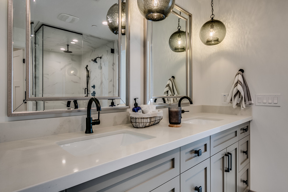 Mid-sized country master bathroom in Phoenix with recessed-panel cabinets, grey cabinets, an alcove shower, white tile, ceramic tile, white walls, ceramic floors, an undermount sink, granite benchtops, grey floor, a hinged shower door and white benchtops.