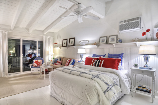 Design ideas for a beach style guest bedroom in Orange County.