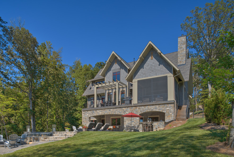 Example of a transitional home design design in Charlotte