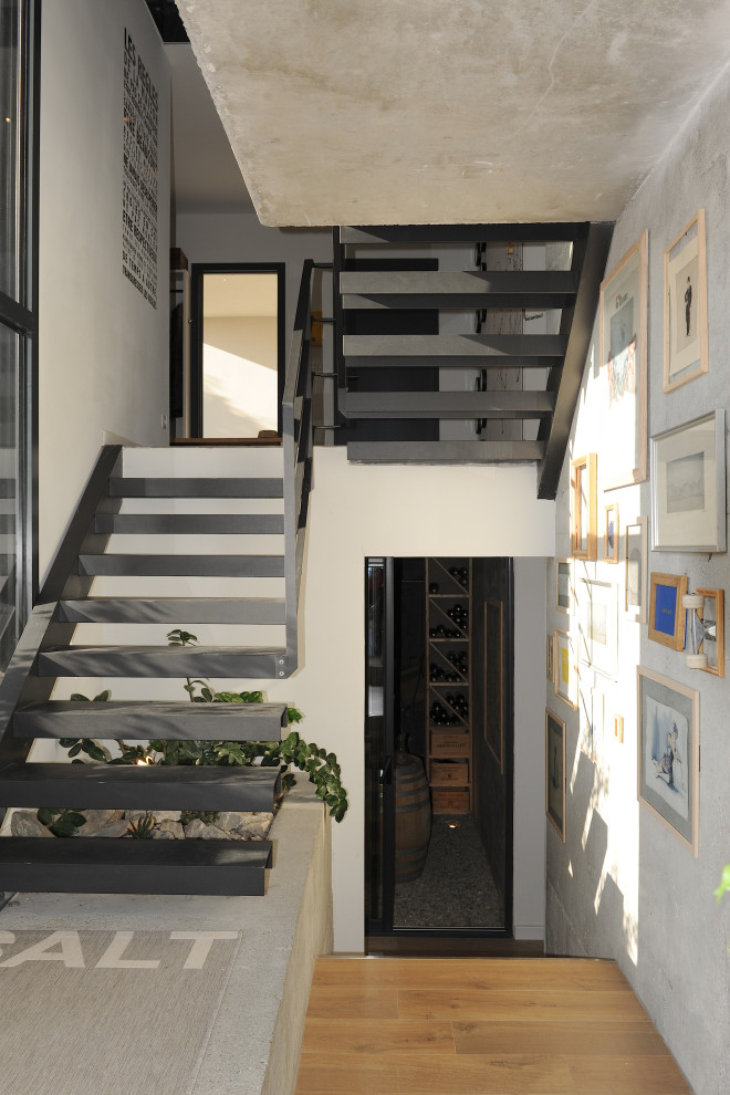 Mid-sized modern concrete straight staircase in Other.
