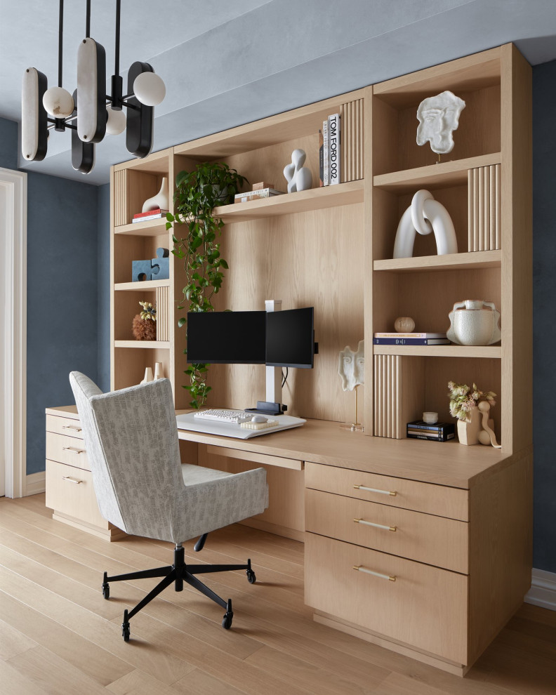 Inspiration for a contemporary light wood floor and beige floor home office remodel in Philadelphia with blue walls