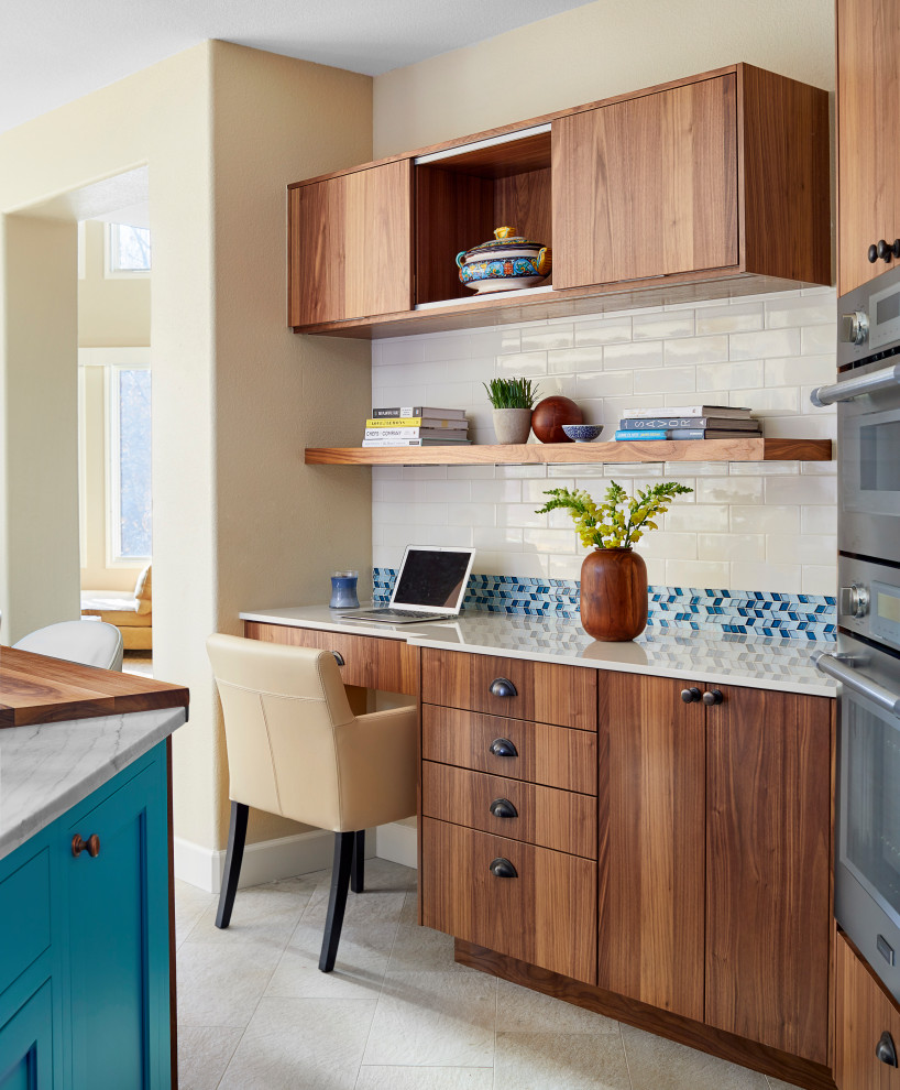 Eat-in kitchen - mid-sized transitional u-shaped porcelain tile and white floor eat-in kitchen idea in Denver with a double-bowl sink, flat-panel cabinets, medium tone wood cabinets, quartzite countertops, multicolored backsplash, ceramic backsplash, stainless steel appliances, an island and white countertops