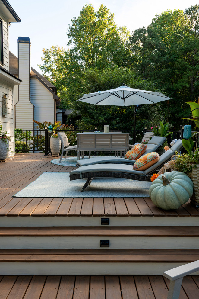 Transitional backyard second story metal railing deck photo in Atlanta with a bbq area and no cover