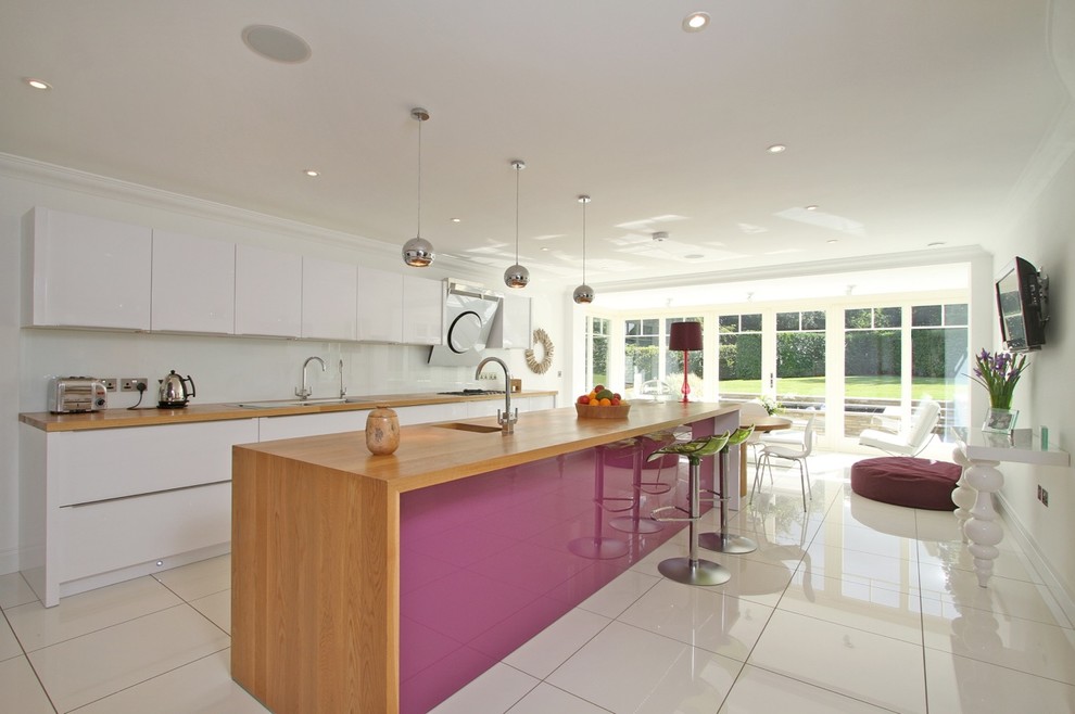 This is an example of a large contemporary kitchen in Sussex.