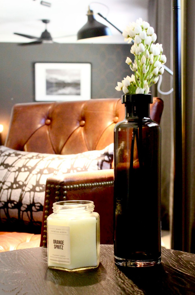 Photo of a mid-sized eclectic guest bedroom in Sydney with grey walls, carpet, no fireplace, grey floor and wallpaper.