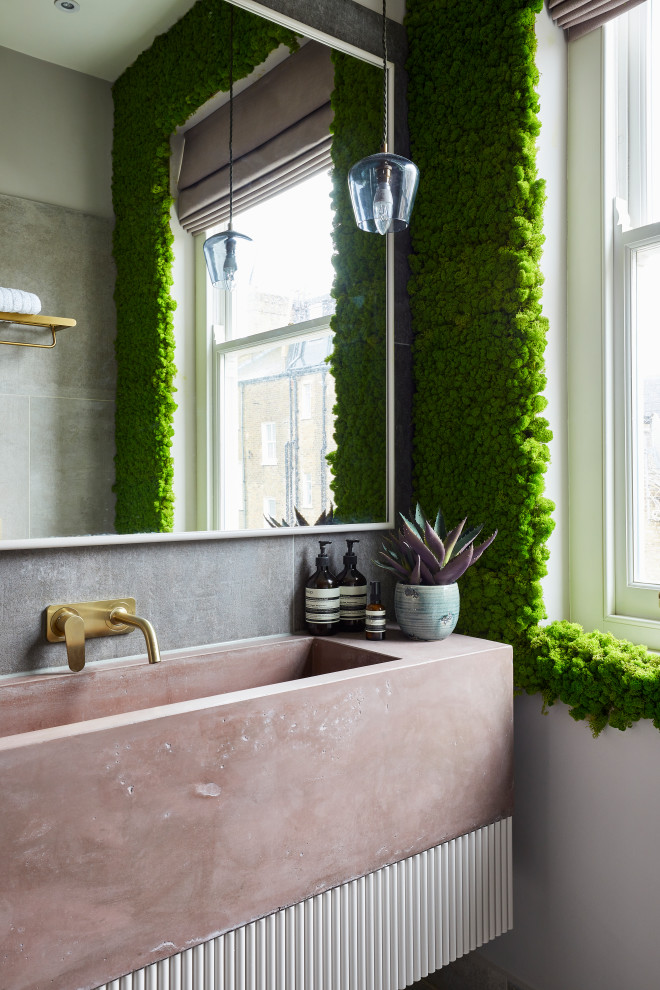 Inspiration for a medium sized urban ensuite bathroom in Other with white cabinets, a walk-in shower, a one-piece toilet, grey tiles, ceramic tiles, green walls, ceramic flooring, a trough sink, concrete worktops, grey floors, pink worktops, a single sink, a floating vanity unit and flat-panel cabinets.
